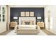 Chic bedroom featuring a stylish headboard, decorative pillows, and soft lighting for a comfortable atmosphere at 2451 Livi Ln, Buford, GA 30519