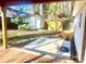 Backyard features a storage shed, wooden fence and stone patio at 5206 Westhill Nw Dr, Norcross, GA 30071