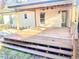 Wooden deck with stairs and awning, overlooking the backyard at 5206 Westhill Nw Dr, Norcross, GA 30071