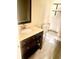 Bathroom with modern vanity, toilet, and neutral color scheme at 5206 Westhill Nw Dr, Norcross, GA 30071