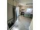 Kitchen featuring stainless steel appliances, stone countertops and stylish cabinetry at 5206 Westhill Nw Dr, Norcross, GA 30071