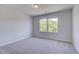 Bright, carpeted bedroom with lots of natural light through two windows at 132 Dalston Cv, Stockbridge, GA 30281