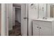 Bathroom featuring a vanity with storage, a mirror, and a doorway into the next room at 2367 Cascade Sw Rd # 9C, Atlanta, GA 30311