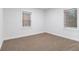 Light-filled bedroom featuring neutral carpeting and ample natural light at 2367 Cascade Sw Rd # 9C, Atlanta, GA 30311