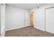 Bedroom features carpet, white trim, and a closet at 2367 Cascade Sw Rd # 9C, Atlanta, GA 30311