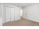 Spacious bedroom with a closet and neutral carpeting at 2367 Cascade Sw Rd # 9C, Atlanta, GA 30311