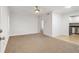 Bright living room featuring plush carpet, white trim, and a ceiling fan at 2367 Cascade Sw Rd # 9C, Atlanta, GA 30311