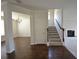 Foyer view shows staircase, living room and dining room for seamless entertaining at 2417 Overlook Ave, Lithonia, GA 30058
