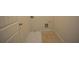 A compact laundry room area features tile and connections for a washer and dryer at 2417 Overlook Ave, Lithonia, GA 30058