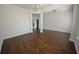 Open-concept living area with hardwood floors at 2417 Overlook Ave, Lithonia, GA 30058