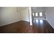 Bright living room with hardwood floors at 2417 Overlook Ave, Lithonia, GA 30058