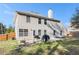 Spacious backyard with ample space for outdoor activities and relaxation on the concrete patio at 1921 Boulder Gate Dr, Ellenwood, GA 30294