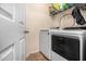 Efficient laundry area with modern washer and dryer at 1921 Boulder Gate Dr, Ellenwood, GA 30294