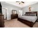 Large main bedroom featuring ample furniture space, carpet, and generous natural light at 1921 Boulder Gate Dr, Ellenwood, GA 30294