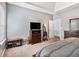 Spacious main bedroom with modern decor, carpet, and generous natural light at 1921 Boulder Gate Dr, Ellenwood, GA 30294