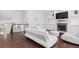 Bright and open living room with modern decor, a fireplace, and built-in shelves at 2363 Palladian Manor Se Way # 4, Atlanta, GA 30339