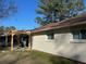 Exterior side of home featuring backyard with pergola covered patio and brick at 3260 Valley Bend Rd, Atlanta, GA 30349