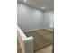 Cozy bedroom space with fresh paint, plush carpet, and ample sunlight from the window at 3260 Valley Bend Rd, Atlanta, GA 30349