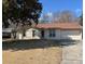 Charming single-story home with a well-maintained lawn, brick facade, and attached garage at 3260 Valley Bend Rd, Atlanta, GA 30349