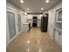 Spacious kitchen with white cabinets, stainless steel appliances, and ample counter space at 3260 Valley Bend Rd, Atlanta, GA 30349