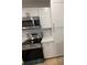 Bright kitchen featuring white cabinets, stainless steel appliances, and light countertops at 3260 Valley Bend Rd, Atlanta, GA 30349