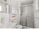 Bathroom with a sink, toilet, shower, and white tile at 5558 Kingsport Dr # 27, Atlanta, GA 30342