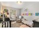 Bedroom with a rocking chair, crib, and toddler bed at 5558 Kingsport Dr # 27, Atlanta, GA 30342