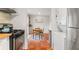 Cozy dining room adjoining kitchen, with terracotta tile, and convenient in-unit laundry at 5558 Kingsport Dr # 27, Atlanta, GA 30342