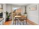 Dining room with large sliding door and terracotta floors at 5558 Kingsport Dr # 27, Atlanta, GA 30342