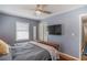 Serene bedroom with hardwood floors, closet, ceiling fan, and natural light at 933 Vistavia Cir, Decatur, GA 30033