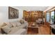 Cozy living room with a large bay window, built-in bookshelves, hardwood floors, and comfortable seating at 933 Vistavia Cir, Decatur, GA 30033
