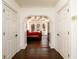 View of bedroom with arched entrance, windows and trey ceiling at 1435 Jay Ct, Snellville, GA 30078