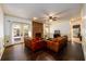 Spacious living room with hardwood floors, fireplace, and access to outdoor patio at 1435 Jay Ct, Snellville, GA 30078