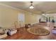 Spacious finished basement with wood floors and ceiling fans at 2554 Emerald Dr, Jonesboro, GA 30236