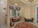 Luxurious bathroom with a copper soaking tub, tiled shower, and natural light provides a spa-like experience at 2554 Emerald Dr, Jonesboro, GA 30236