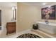 Bathroom with vanity on the left and soaking tub with walk in shower at 2554 Emerald Dr, Jonesboro, GA 30236