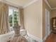 Charming bedroom with window seat and decorative details at 2554 Emerald Dr, Jonesboro, GA 30236