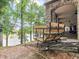 A sloped funicular rail car provides access from the home's patio to the waterfront at 2554 Emerald Dr, Jonesboro, GA 30236