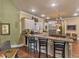 Open concept kitchen with an island, stainless steel appliances, and bar seating at 2554 Emerald Dr, Jonesboro, GA 30236