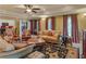 Spacious living room with plush seating and access to kitchen at 2554 Emerald Dr, Jonesboro, GA 30236