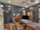 Office featuring a dark trim, built-in bookcases, wood floors, and large desk at 2554 Emerald Dr, Jonesboro, GA 30236