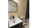 Bathroom featuring modern vanity, sleek fixtures, and stylish gray tile in the shower at 109 Thirkield Se Ave, Atlanta, GA 30315