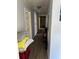 A narrow hallway with a neutral color and doors on both sides of the hall at 109 Thirkield Se Ave, Atlanta, GA 30315
