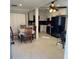 Spacious kitchen featuring ample white cabinetry, stainless steel appliances, and dining area at 109 Thirkield Se Ave, Atlanta, GA 30315