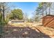 Expansive backyard with mature trees, ideal for outdoor activities and entertainment at 4251 Canby Ln, Decatur, GA 30035