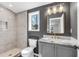 Bathroom with grey walls, shower, and grey vanity at 4251 Canby Ln, Decatur, GA 30035
