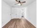 Bedroom with closet, hardwood floors, and a ceiling fan at 4251 Canby Ln, Decatur, GA 30035