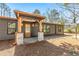Charming home with a stone pillar porch and natural wood accents for a welcoming exterior at 4251 Canby Ln, Decatur, GA 30035