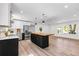 Spacious kitchen with stainless steel appliances, a center island, and a view of the backyard at 4251 Canby Ln, Decatur, GA 30035