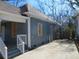 Side view of a home featuring the side yard and concrete steps at 7 Whatley Se St, Atlanta, GA 30315